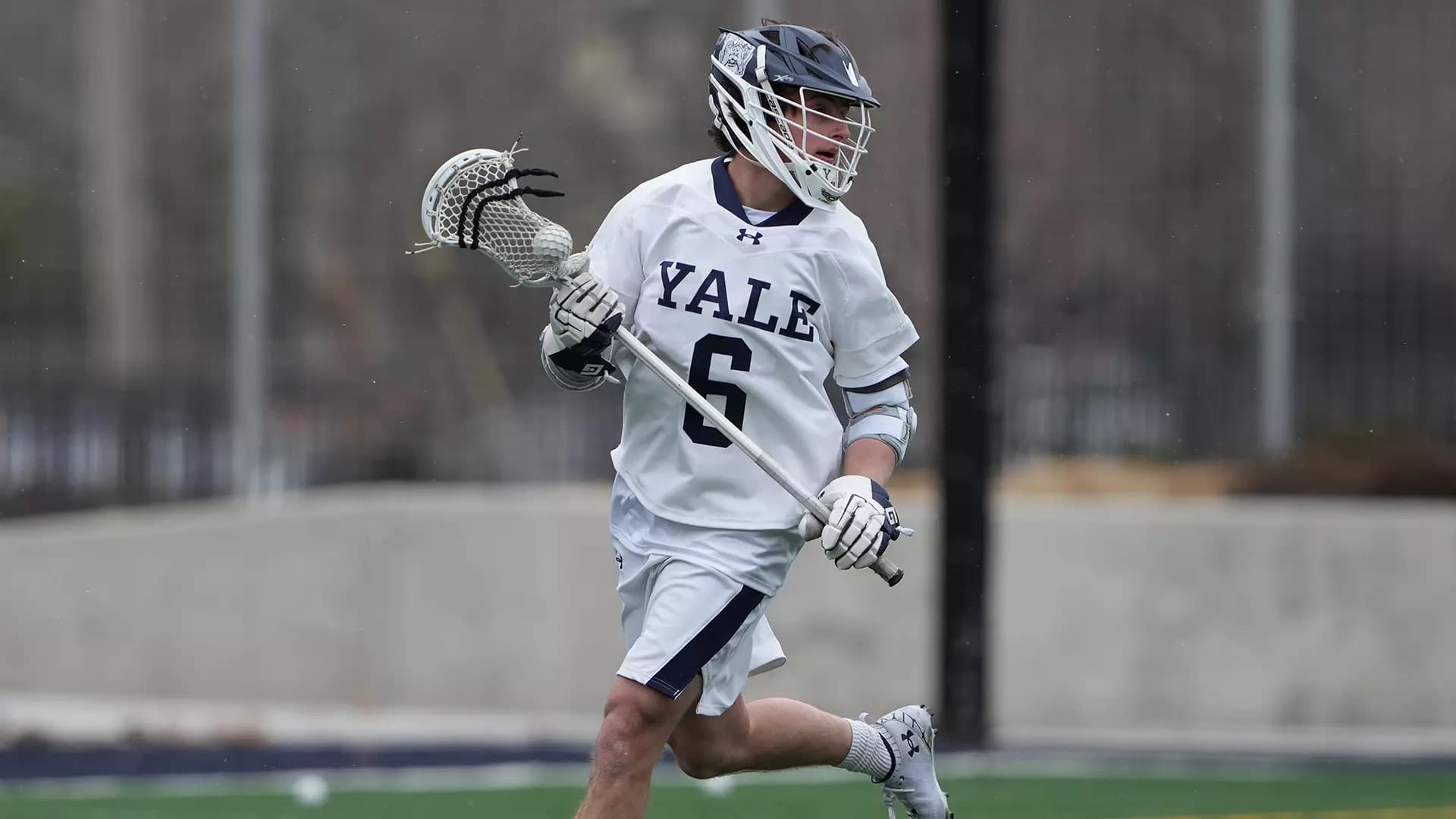 Leo Johnson running with the ball for Yale University